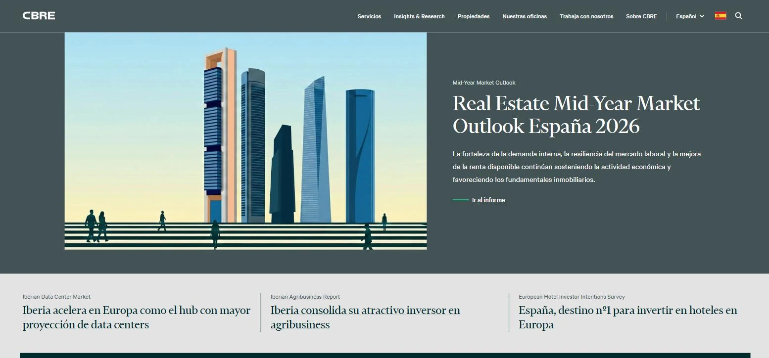 CBRE Spain homepage: a dark green hero with an illustrated Madrid skyline and a serif headline announcing the Mid-Year Market Outlook 2026