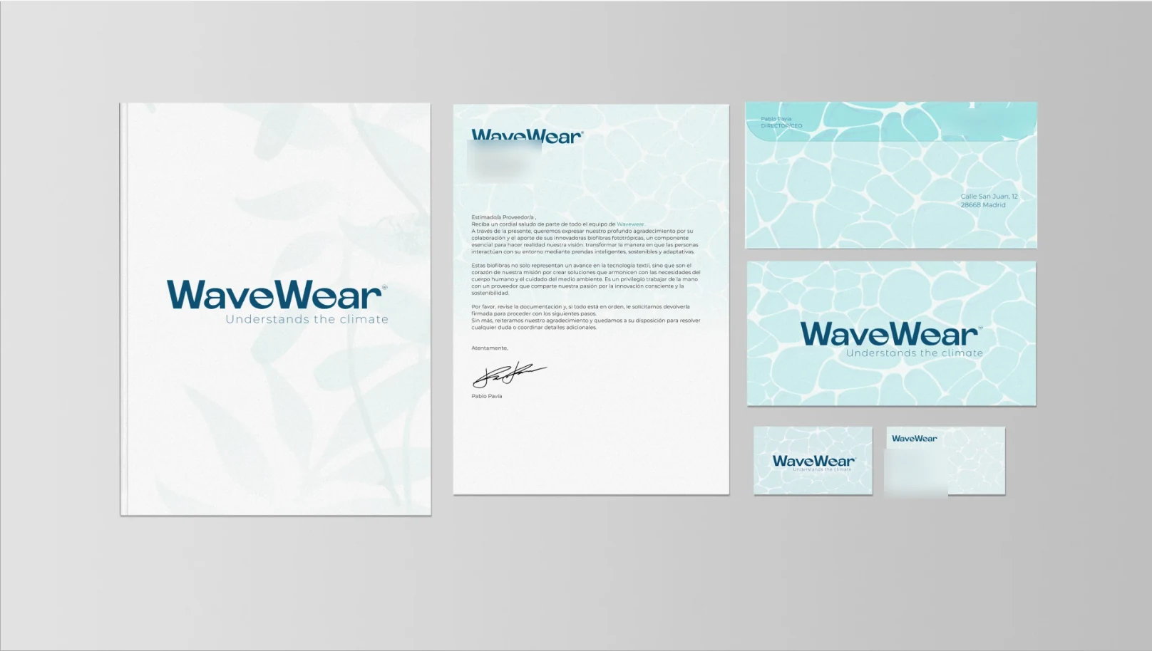 WaveWear stationery suite: brandbook cover, letterhead, envelope, compliment card and business cards, all carrying the seafoam cell pattern